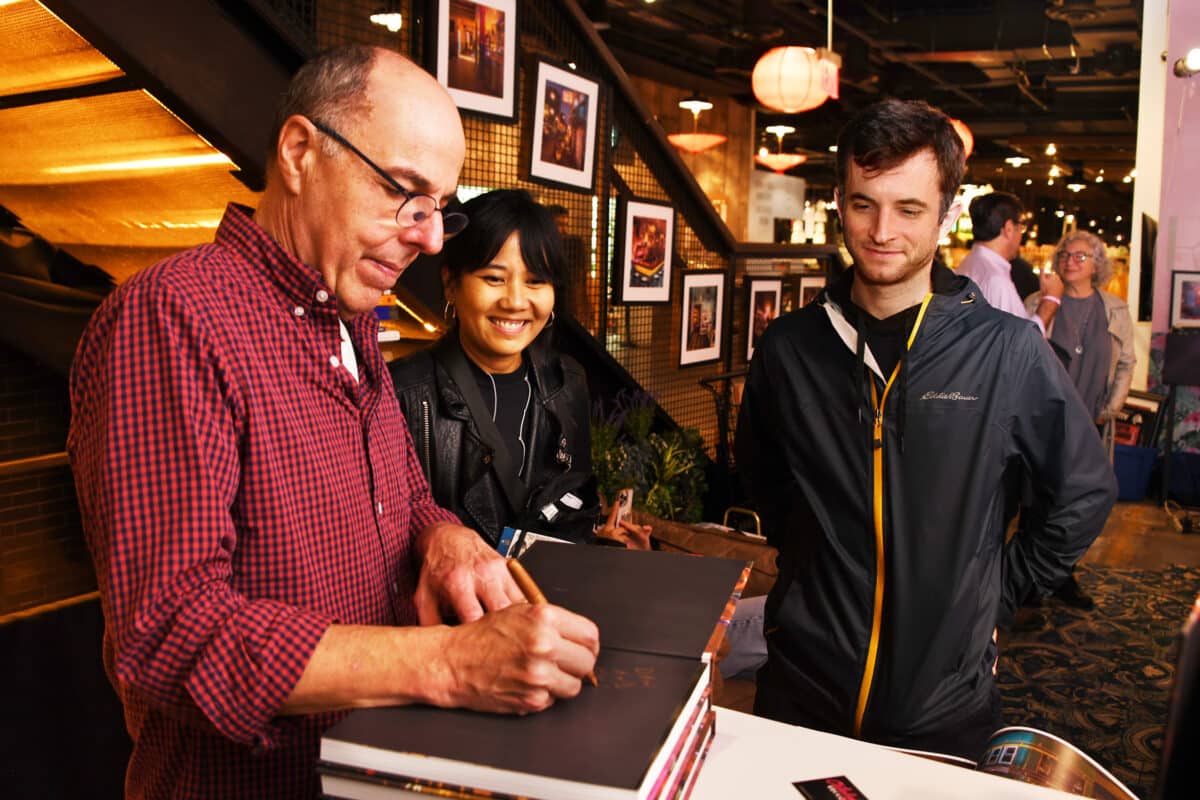 Root signing books at Catalyst Records