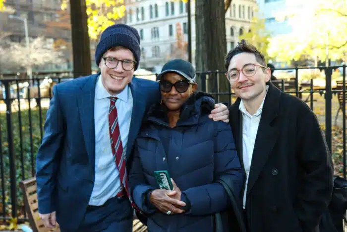 Mother of exonerated Wayne Gardine with Legal Aid Society lawyers following Harlem murder conviction exoneration.