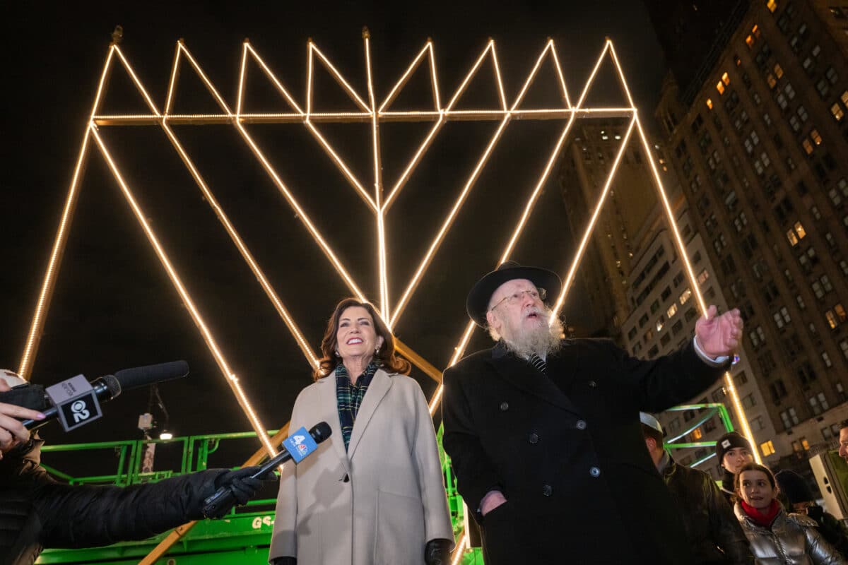 Gov. Kathy Hochul gathered with Jewish community leaders for the lighting of the world's largest menorah on Sunday night in Central Park.