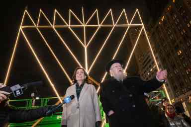 Gov. Kathy Hochul gathered with Jewish community leaders for the lighting of the world's largest menorah on Sunday night in Central Park.