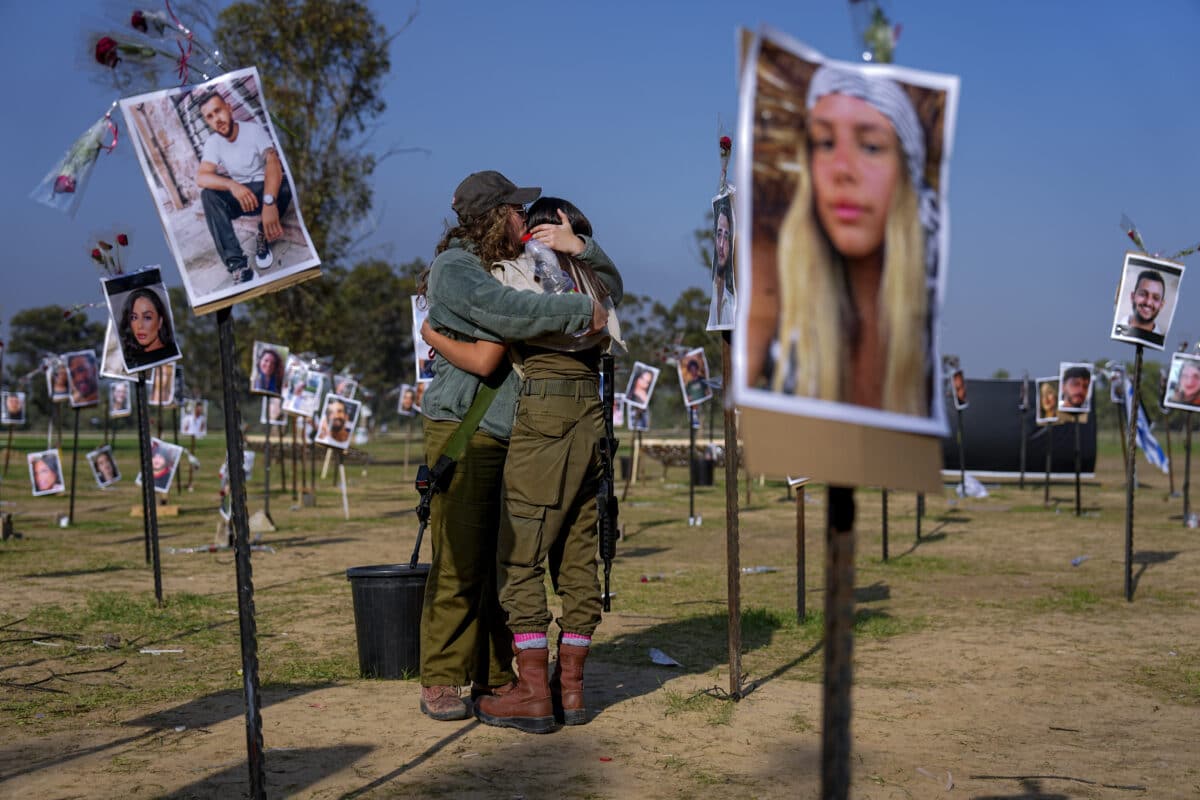 Israeli soldiers embrace as ceasefire ends
