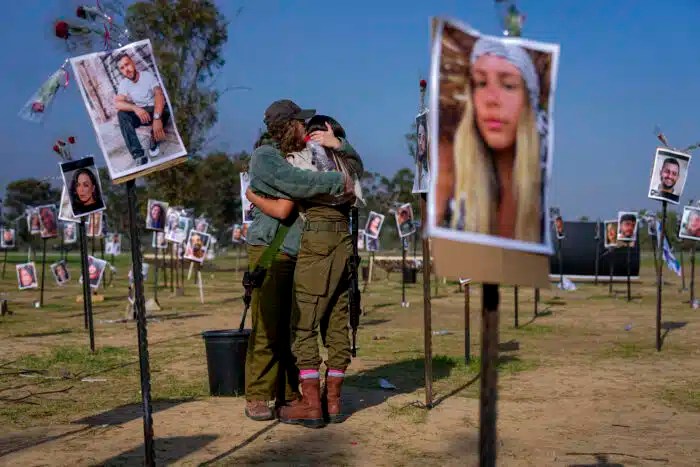 Israeli soldiers embrace as ceasefire ends