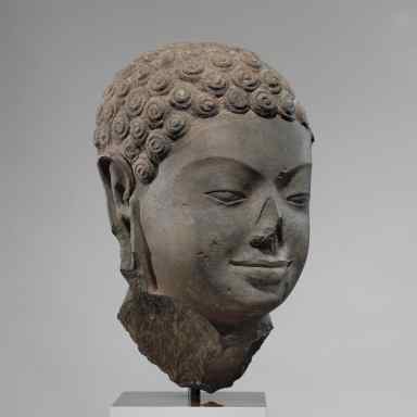 This December 2005 photo shows a 7th century sculpture titled "Head of Buddha" at the Metropolitan Museum of Art in New York.