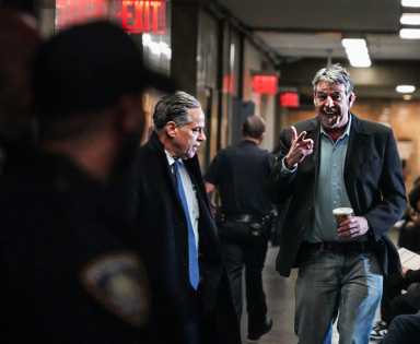 Manhattan horse carriage driver Ian McKeever smiling outside Manhattan court