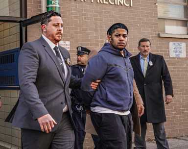 Brooklyn C train shooting suspect escorted by detectives