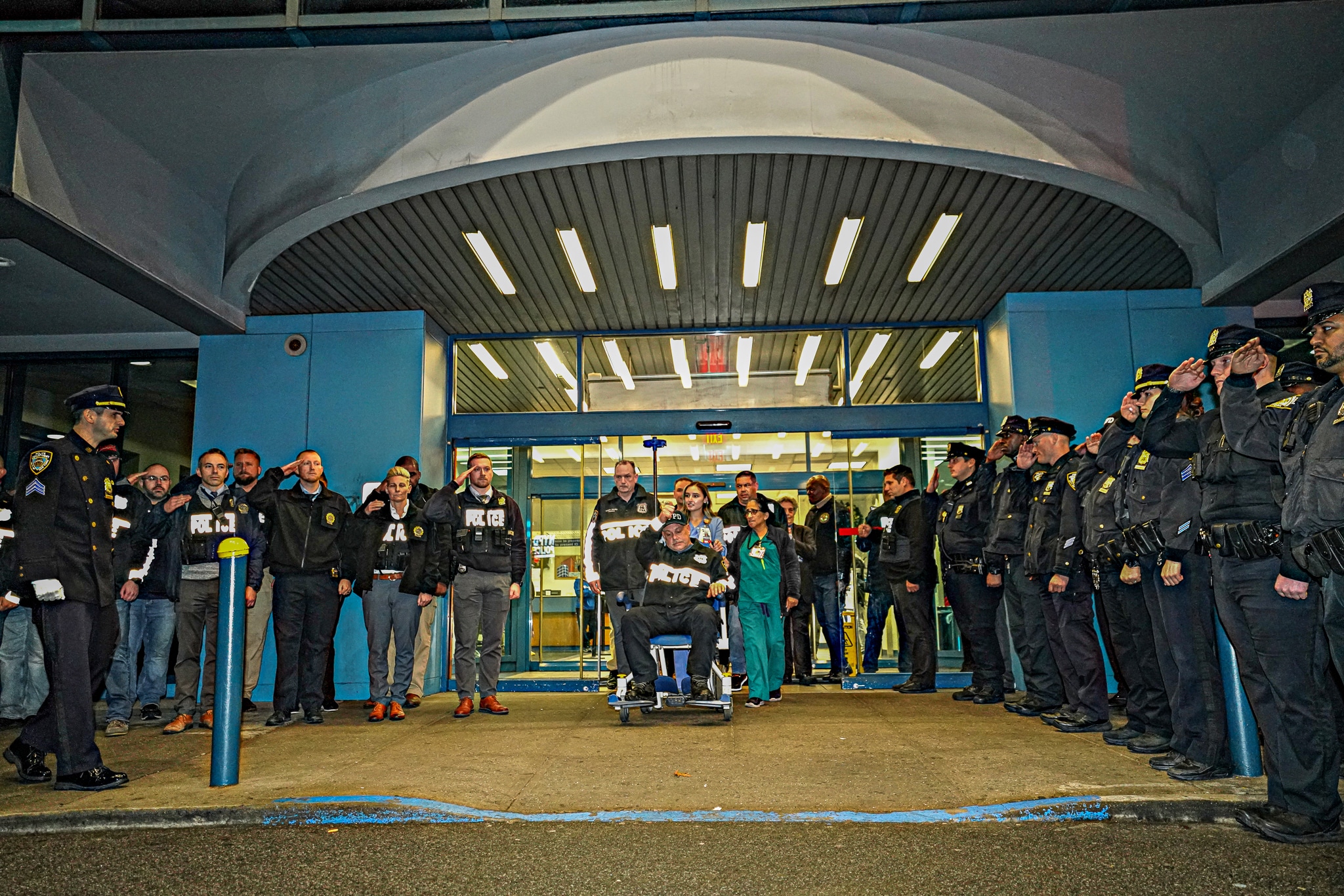 Officers stabbed in Queens rampage hailed as heroes during hospital release 7