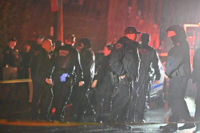 Police at scene of violent Queens stabbing