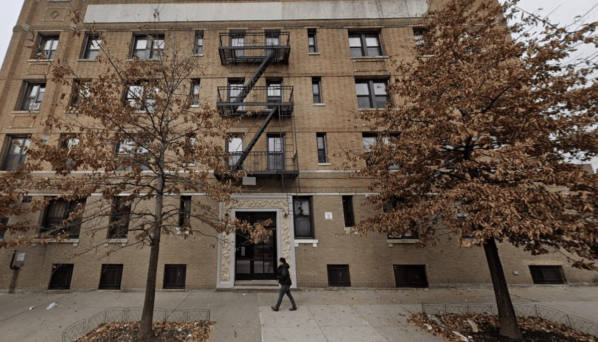The man was found by authorities at the bottom of a flight of stairs inside the Queens apartment building at 28-04 44th St. in Astoria.