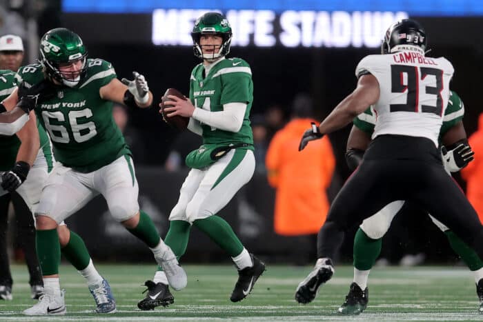 Trevor Siemian (14) drops back to pass against the Atlanta Falcons during the fourth quarter at MetLife Stadium