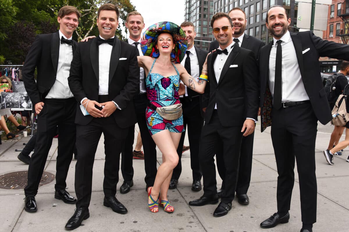 Delphine Le Goff took a break from selling her art at an East Village Flea Market to pose with random passersby