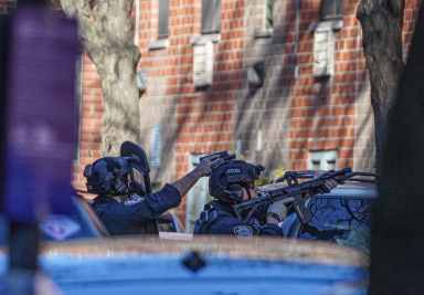 Heavily armed officers during Lower East Side standoff