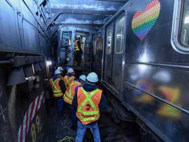 The scene of collision and derailment north of 96 St on the 1 line on Thursday.