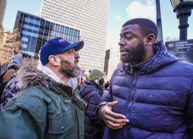 Far right and left activists confront each other at Lower Manhattan migrant rally