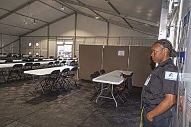Security guard at Randall's Island migrant shelter