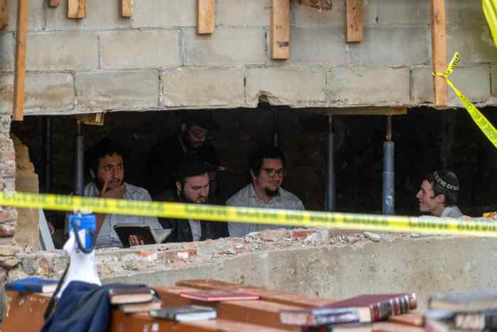 Hasidic men sit in wall of Brooklyn synagogue after tunnel found