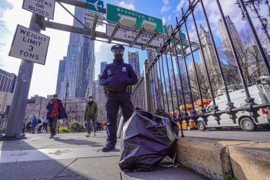 Police officer on Brooklyn Bridge pathway