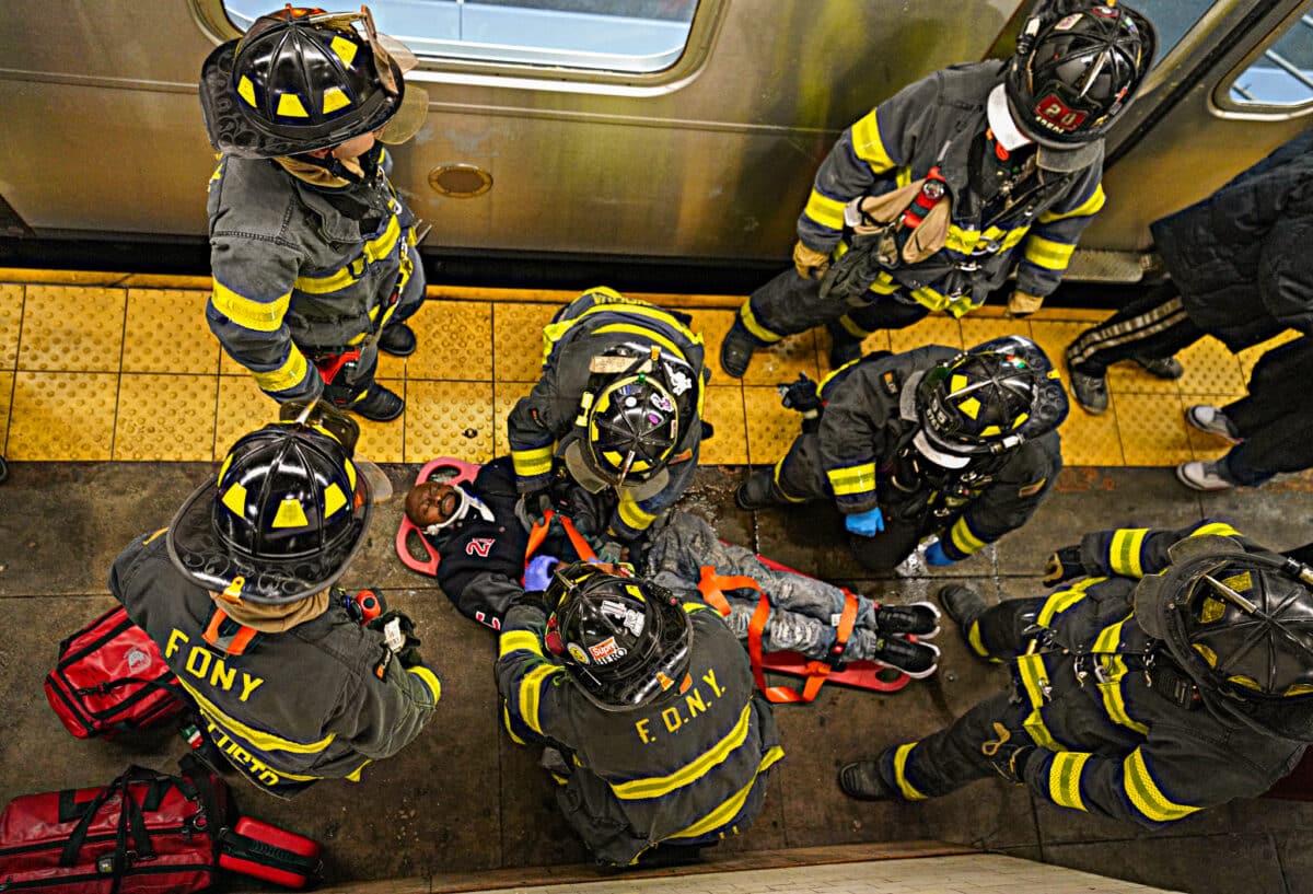 Firefighters help man struck by J train in Lower Manhattan