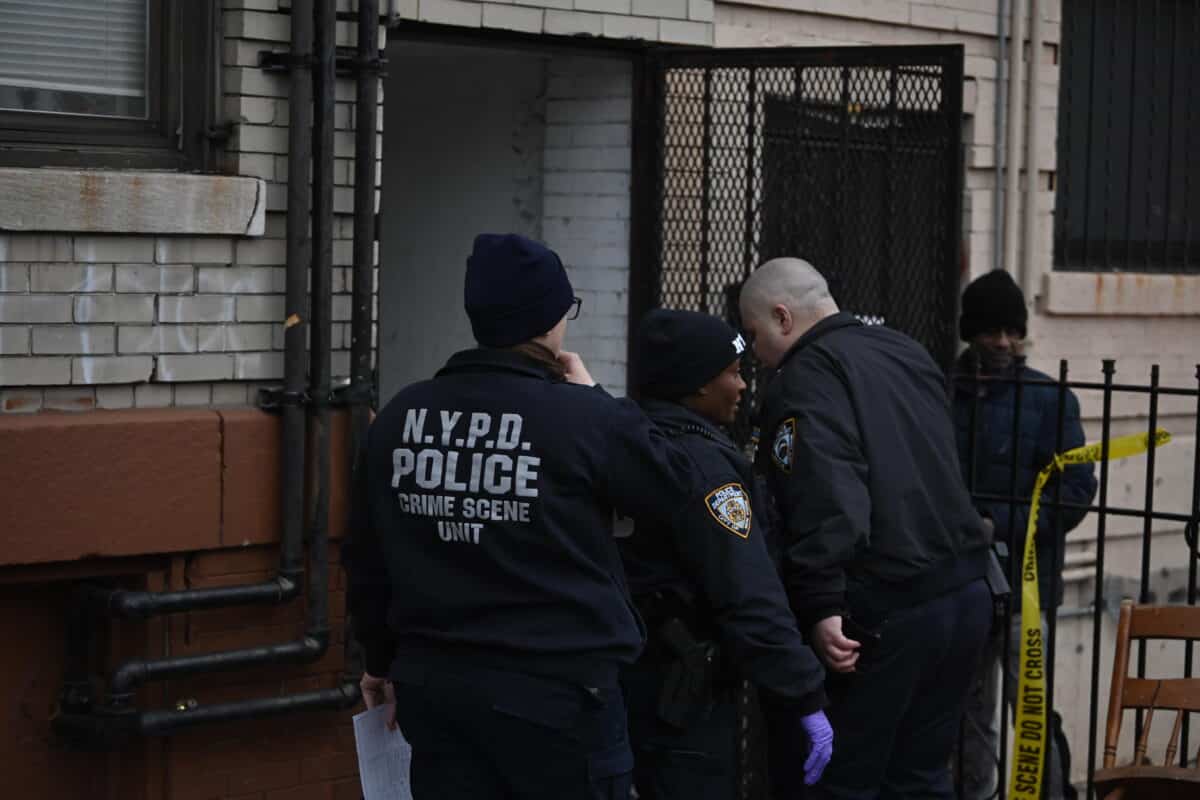 Police at the scene of the fatal shooting in Brooklyn.