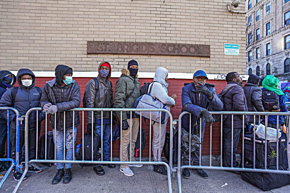 Migrants on line at East Village school