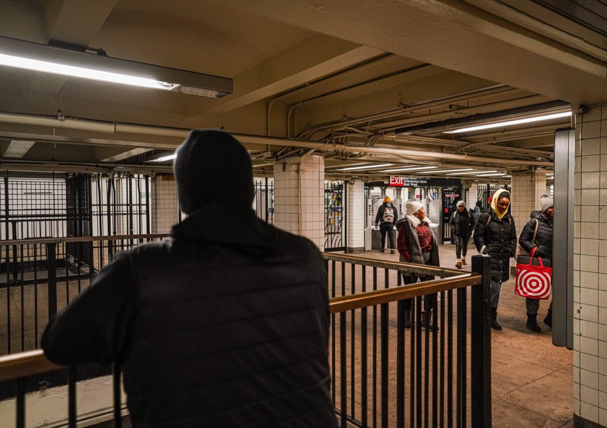 NYPD transit officer patrols subway station