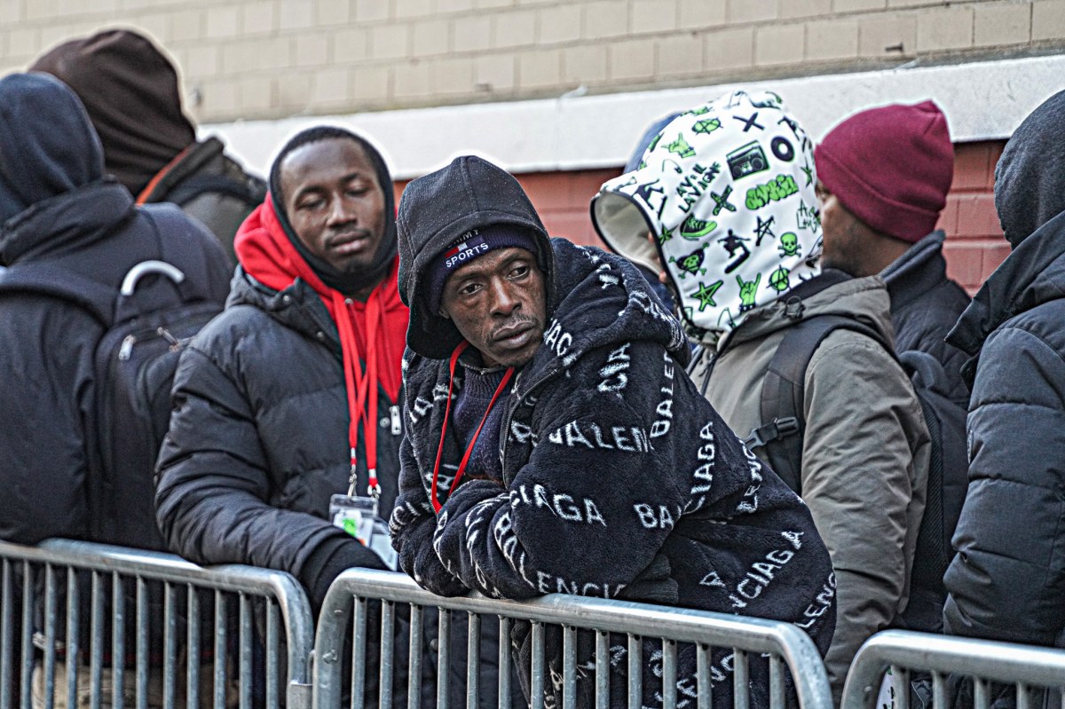 Migrants outside East Village shelter
