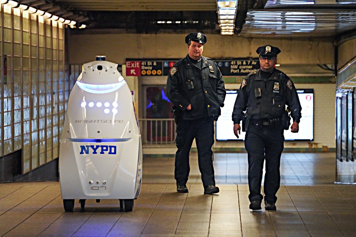 K5 police robot on patrol with officers in Times Square