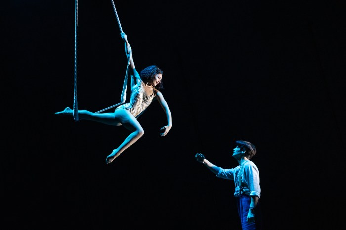 Isabelle McCalla and Grant Gustin as acrobats in Water for Elephants
