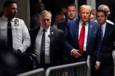 Former President Donald Trump leaves Manhattan criminal court, Thursday, Feb. 15, 2024, in New York. A New York judge says Trump's hush-money trial will go ahead as scheduled with jury selection starting on March 25. (AP Photo/Mary Altaffer)