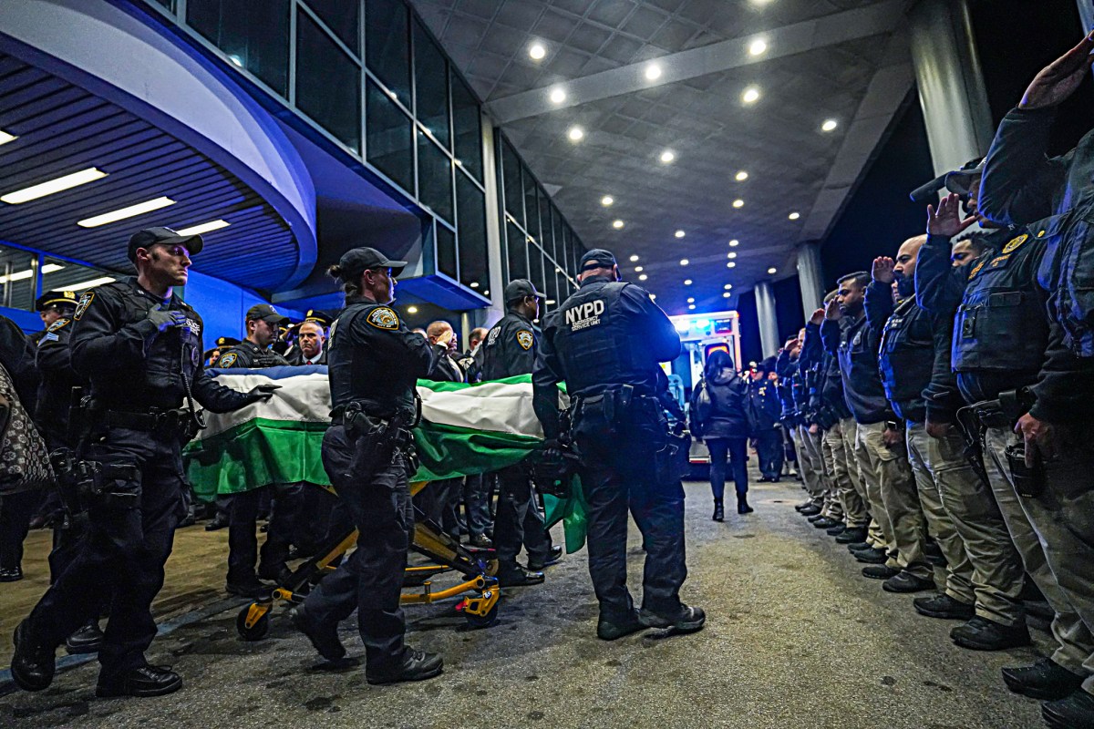 Police officers escort body of slain cop Jonathan Diller in Queens