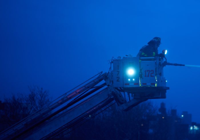 Firefighters rescue woman who was trapped during four-alarm fire in Brooklyn home 7 Firefighters rescue woman