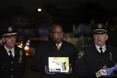 Police officials at scene of Brooklyn police shooting