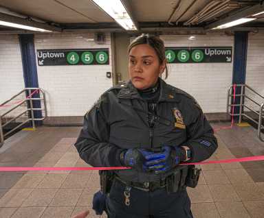 A police officer at Union Square subway station after man stabbed