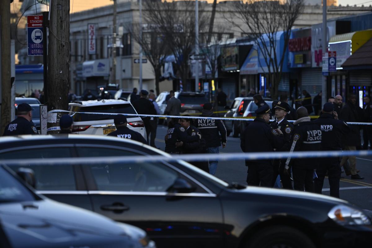 Police in Queens at scene where cop was shot