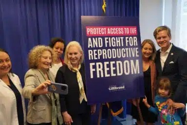 Senator Kirsten Gillibrand and advocates at a March 3 press conference supporting federal legislation to protect access to in vitro fertilization services for couples amid a restrictive Alabama state court ruling.