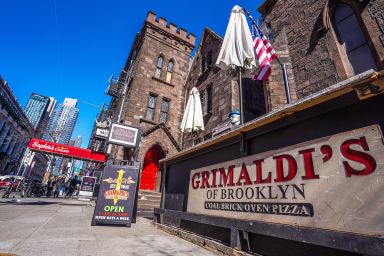 exterior view of the front of Grimaldi's restaurant in day time