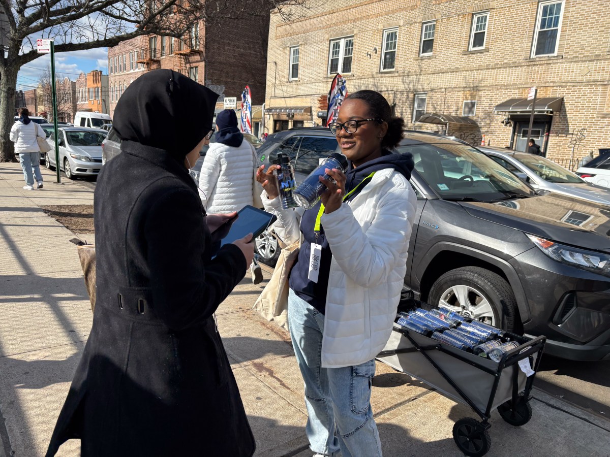 two women in NYC in the daytime discussing a virtual mental health therapy program