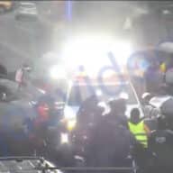 Screenshot of protesters blocking NYPD emergency vehicle in Midtown