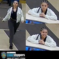 photo of woman with braids wearing sweater and black pants, accused of assault in Upper East Side