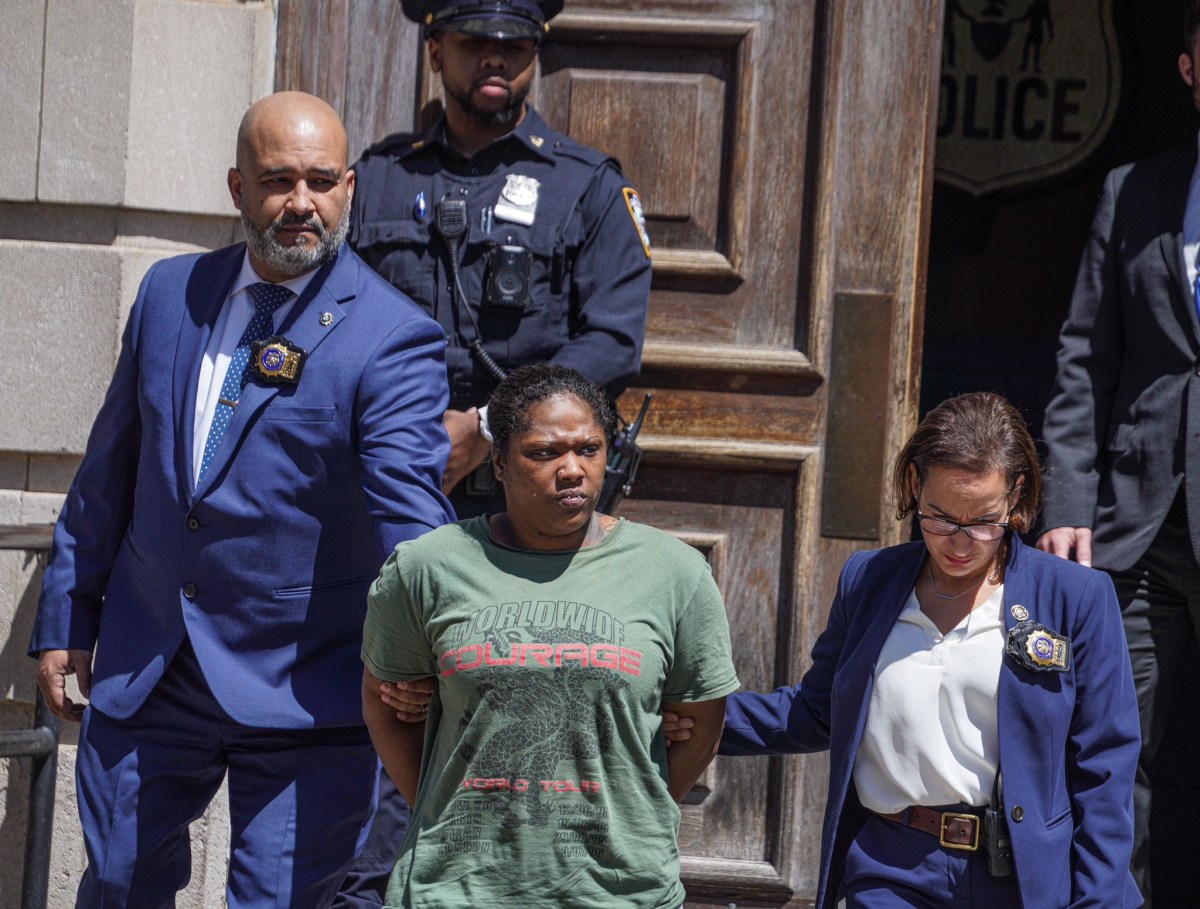 Bronx mother escorted by detectives on charges of killing her daughter