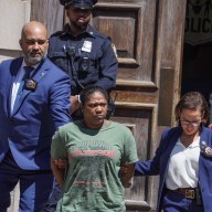 Bronx mother escorted by detectives on charges of killing her daughter