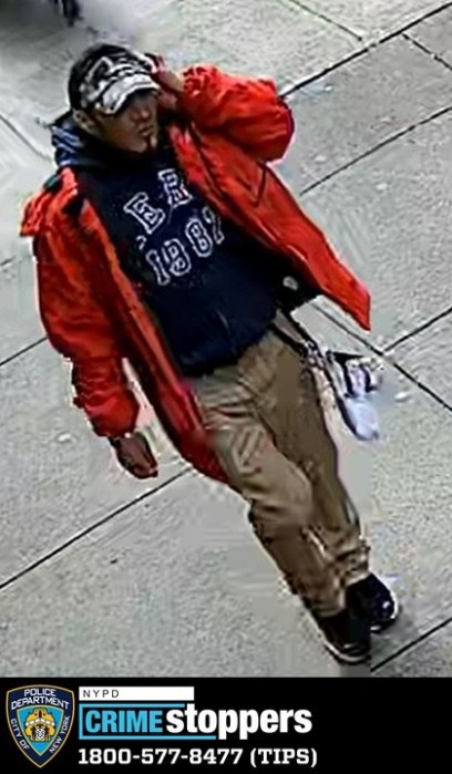 man wearing red jacket, wanted for stabbing a man in Lower East Side Manhattan