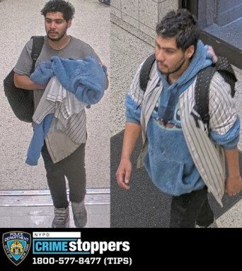 photo of a man with dark hair wearing blue shirt wanted for punching woman in Manhattan