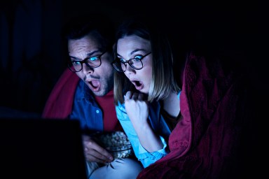 couple movie night horror laptop popcorn love watching entertainment