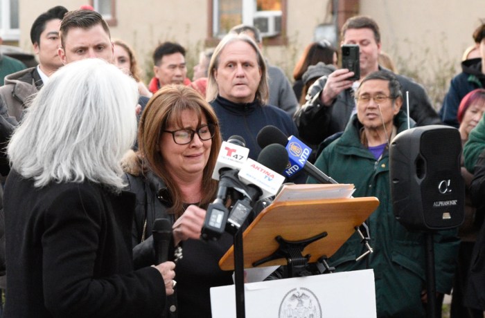 Queens home owner weeps at press conference calling on squatters to be removed from her home