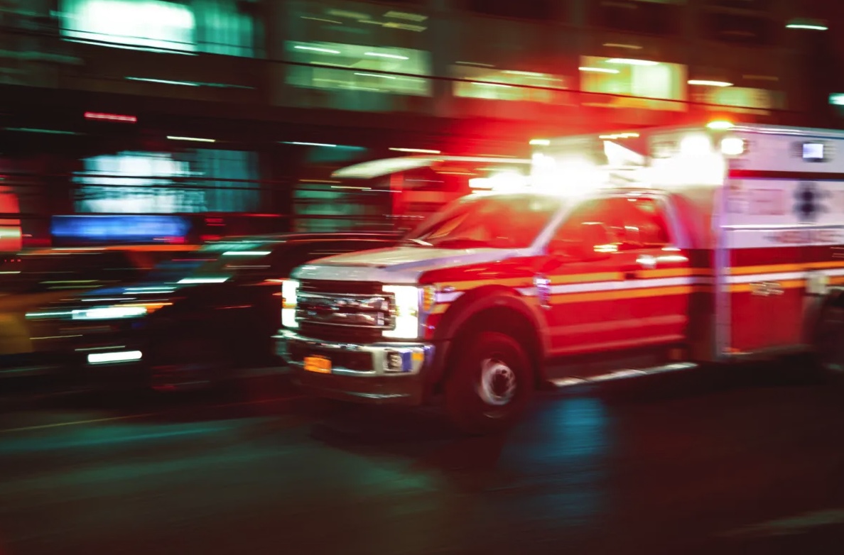 EMS ambulance responds in the Bronx with lights flashing