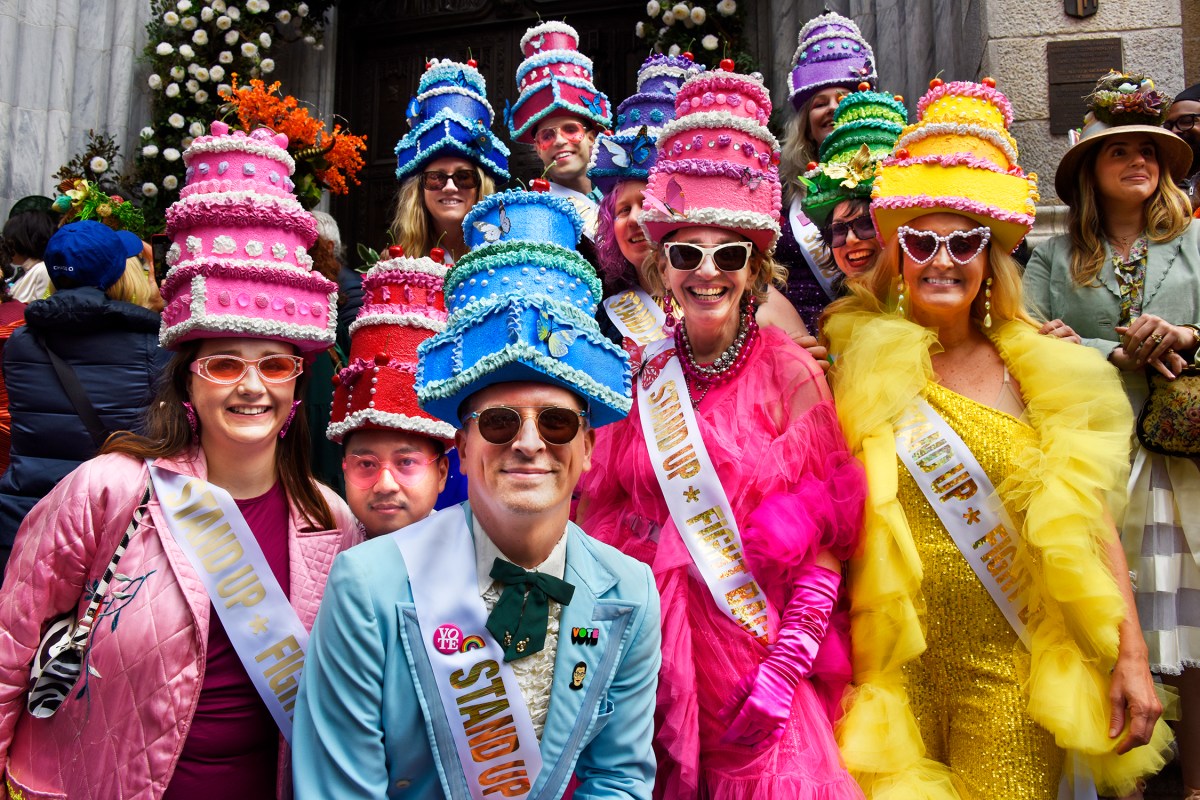 People wearing cake hats at Easter Parade