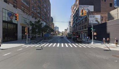 daytime view of a street crosswalk on the West Side in Manhattan