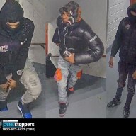 NYPD photo of three suspects wearing black jackets wanted in connection with a robbery in Inwood