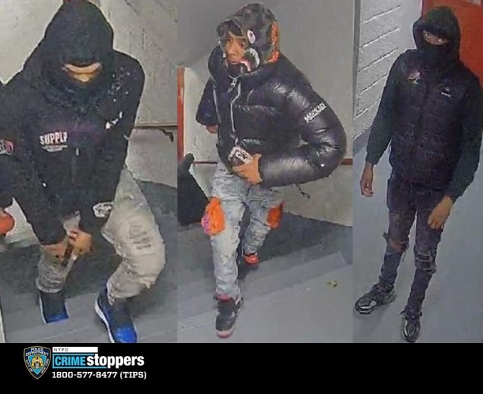 NYPD photo of three suspects wearing black jackets wanted in connection with a robbery in Inwood