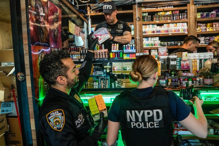 NYPD and Sheriff's office members at illegal cannabis shop raid